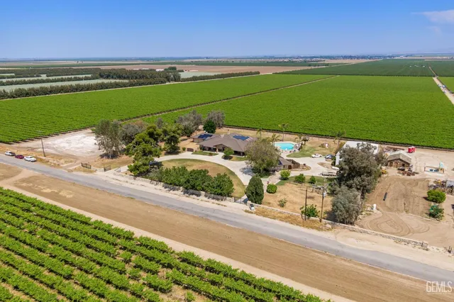 a view of a water pond with green space