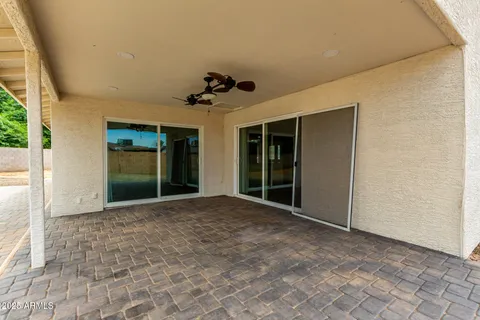 a view of empty room with windows