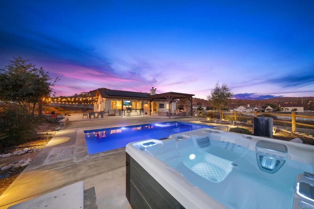 2731 Ortega Road Ramona, CA 92065 - Photo 1 of 1 a view of a pool patio fire pit and outdoor kitchen