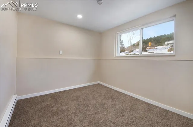 an empty room with window