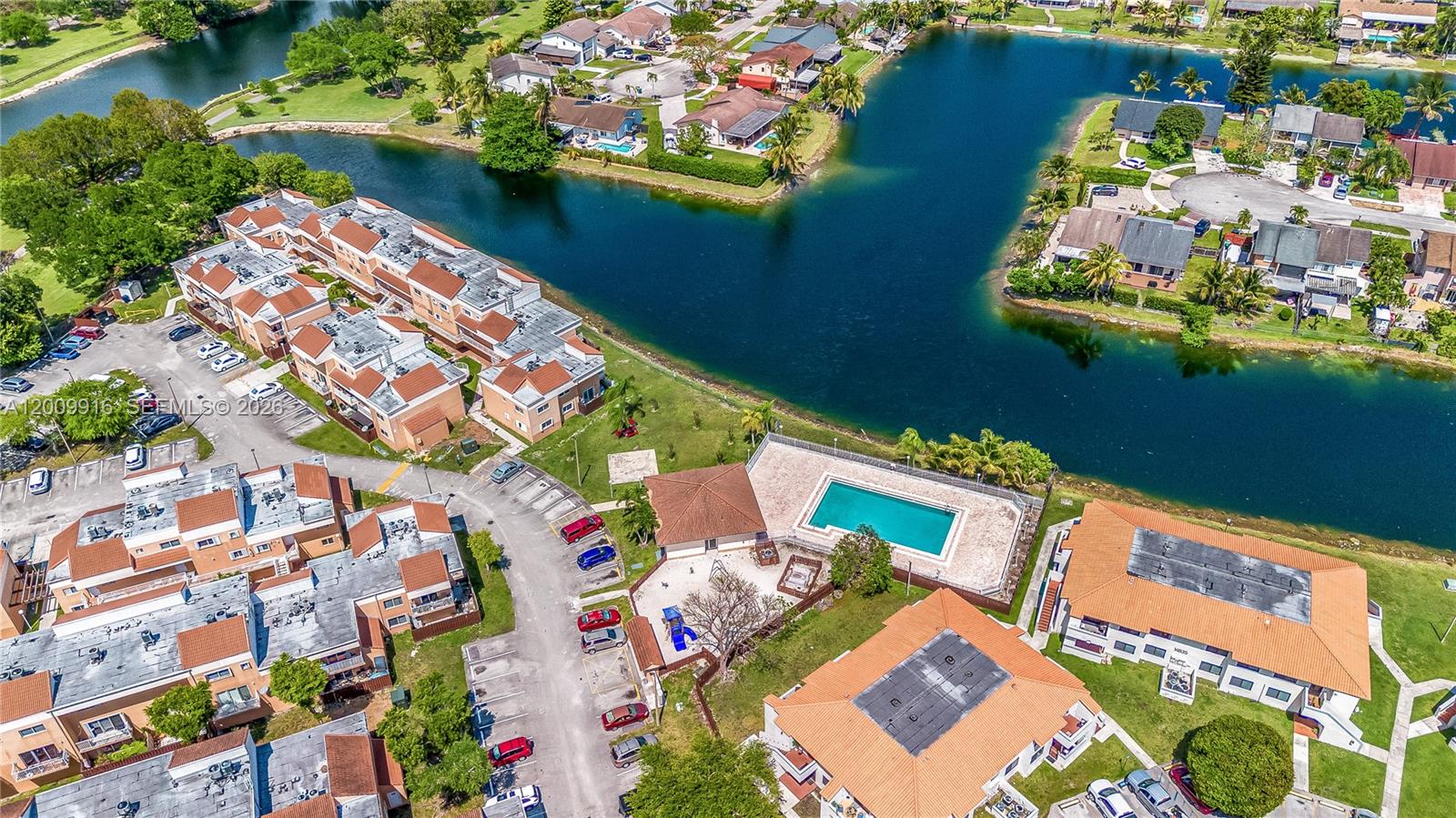 14905 Southwest 80th Street, Unit 212 Miami, FL 33193 - Photo 30 of 37 an aerial view of a houses with outdoor space