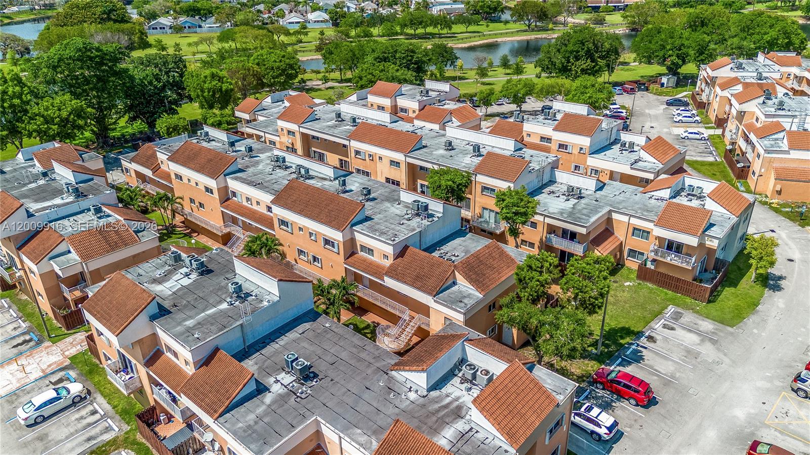 14905 Southwest 80th Street, Unit 212 Miami, FL 33193 - Photo 31 of 37 an aerial view of a city with lots of residential buildings