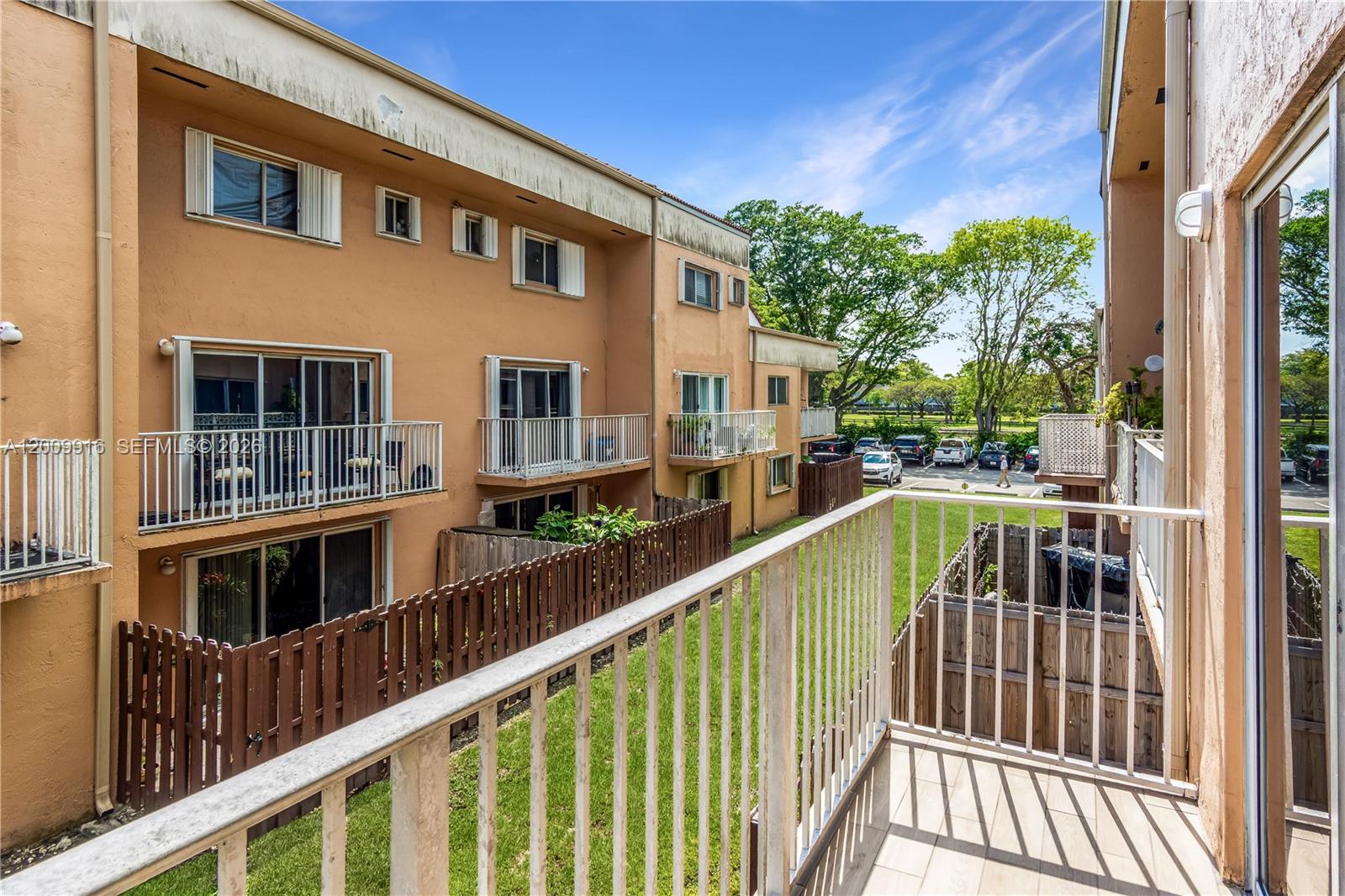 14905 Southwest 80th Street, Unit 212 Miami, FL 33193 - Photo 34 of 37 a view of balcony with furniture