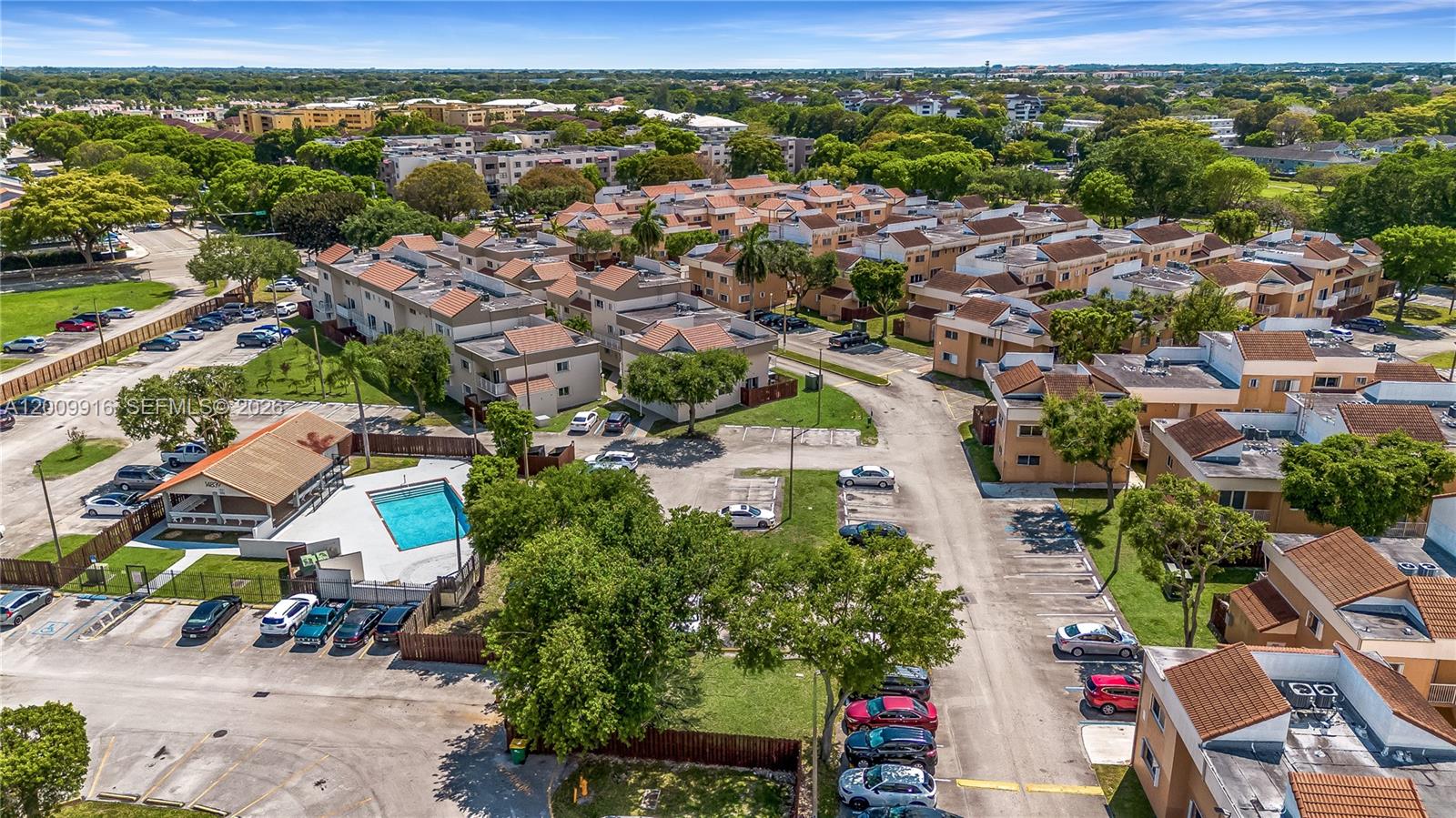 14905 Southwest 80th Street, Unit 212 Miami, FL 33193 - Photo 37 of 37 an aerial view of residential houses with outdoor space
