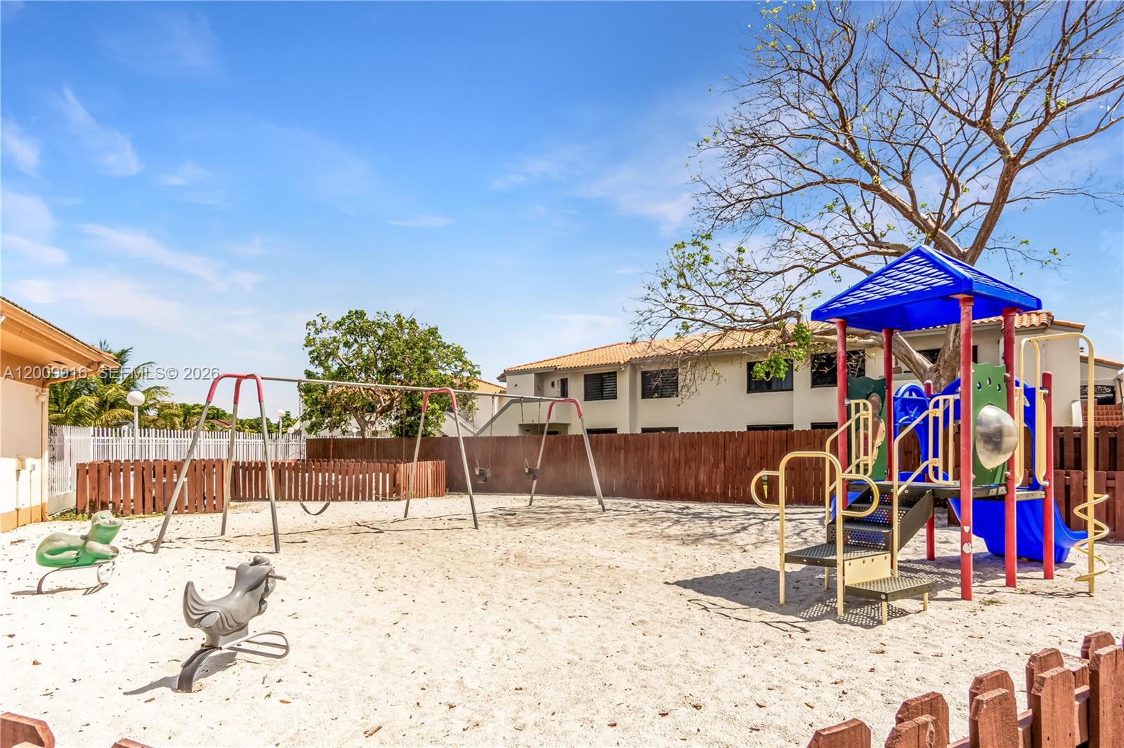14905 Southwest 80th Street, Unit 212 Miami, FL 33193 - Photo 6 of 37 a view of a house with a snow on the yard