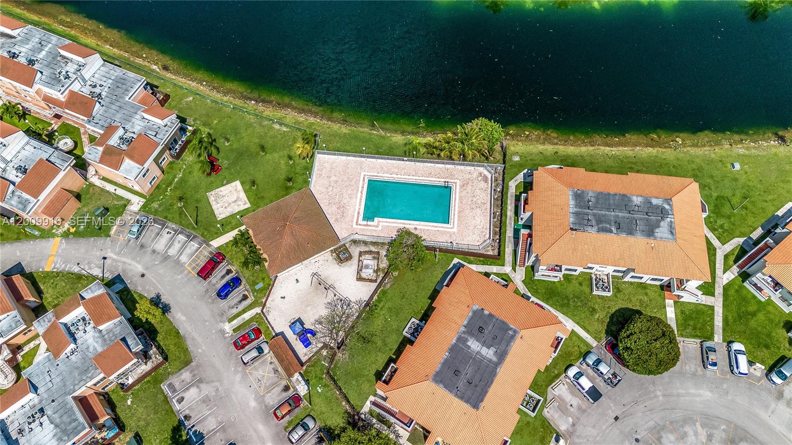 14905 Southwest 80th Street, Unit 212 Miami, FL 33193 - Photo 8 of 37 an aerial view of a house with a lake view