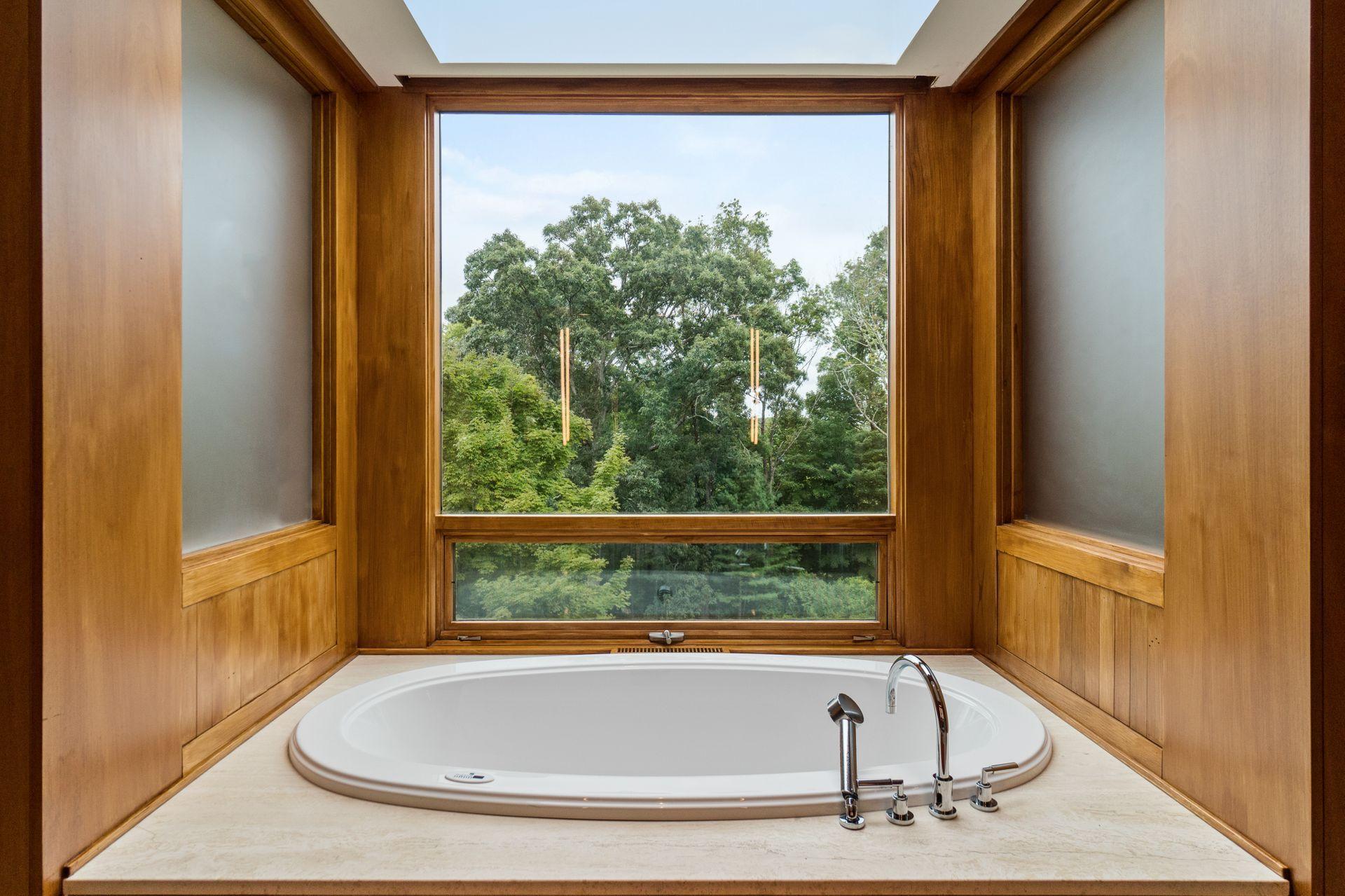 81 Cross Ridge Road New Canaan, CT 06840 - Photo 20 of 49 a view of bathroom with bathtub and shower