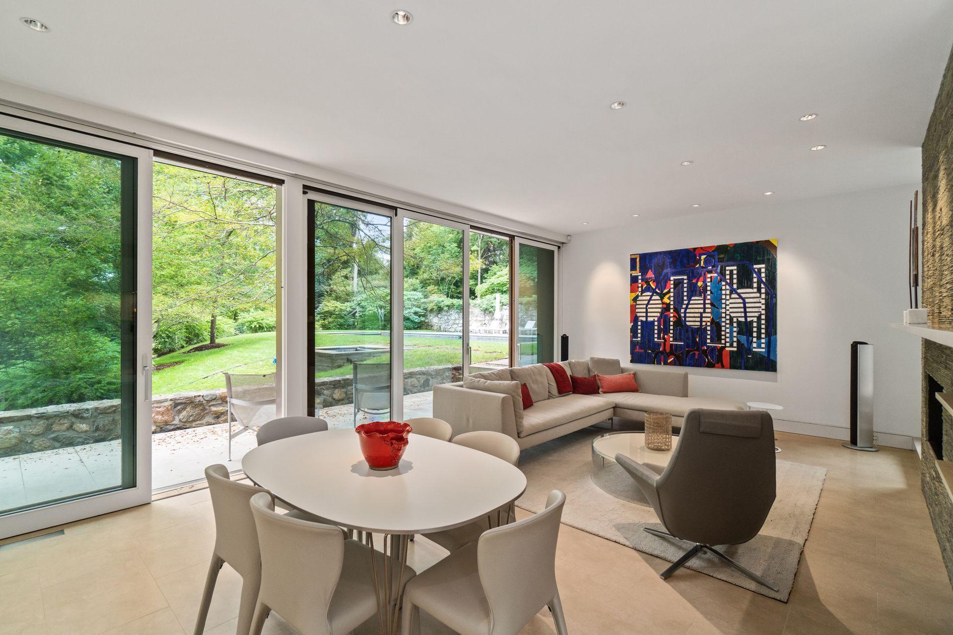 81 Cross Ridge Road New Canaan, CT 06840 - Photo 33 of 49 a living room with furniture and a large window