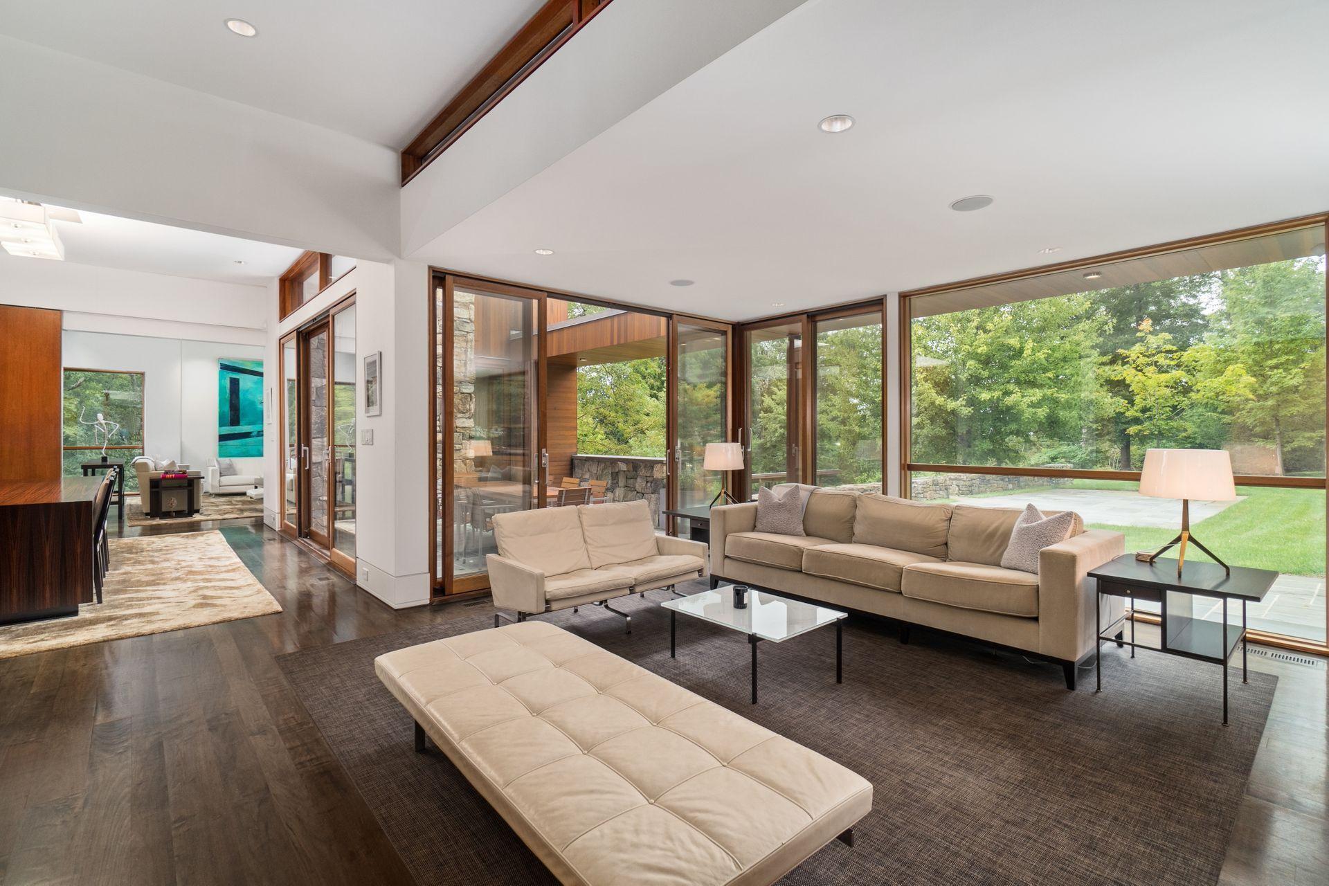 81 Cross Ridge Road New Canaan, CT 06840 - Photo 4 of 49 a living room with furniture and a large window
