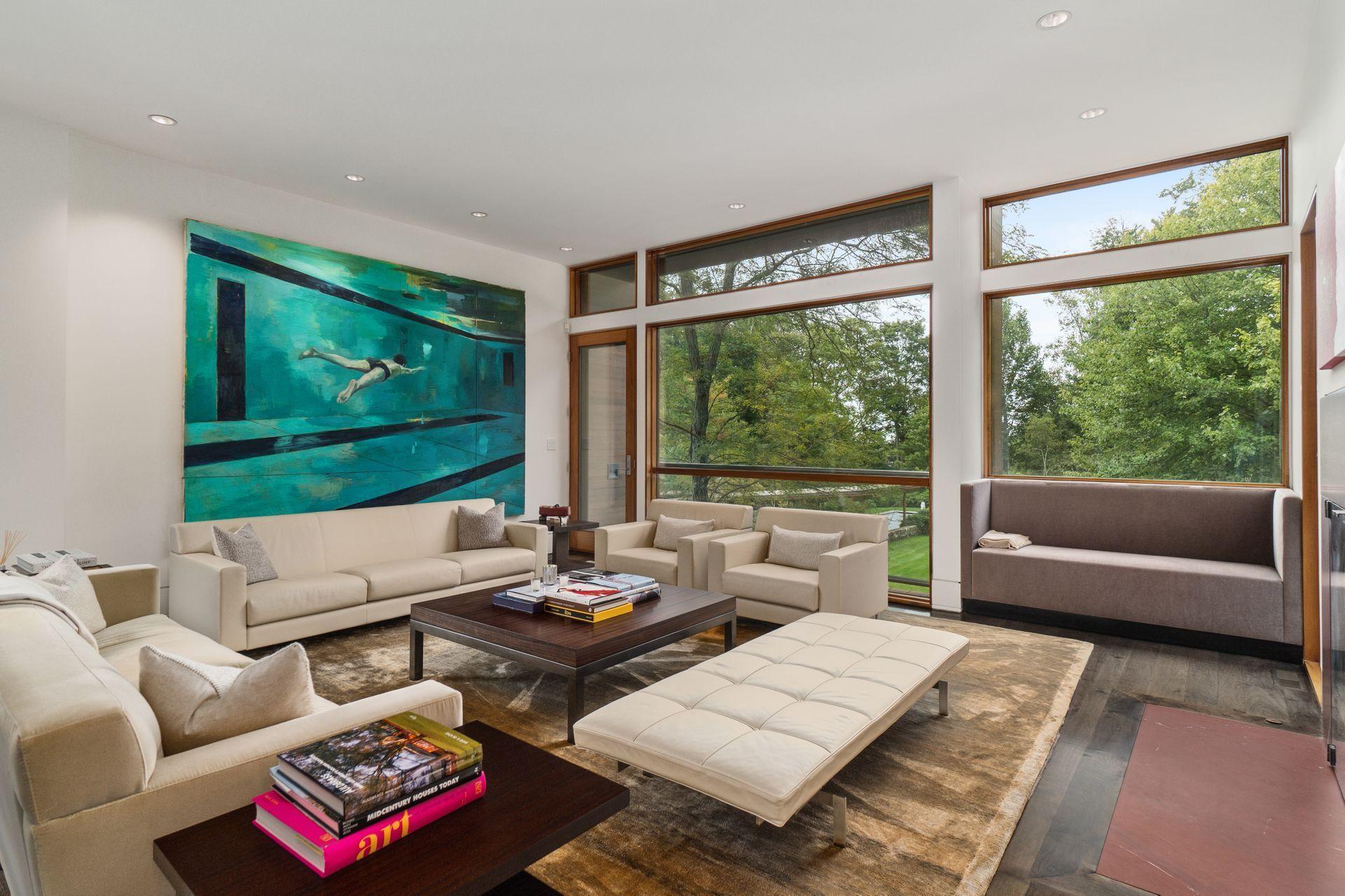 81 Cross Ridge Road New Canaan, CT 06840 - Photo 5 of 49 a living room with furniture and a large window