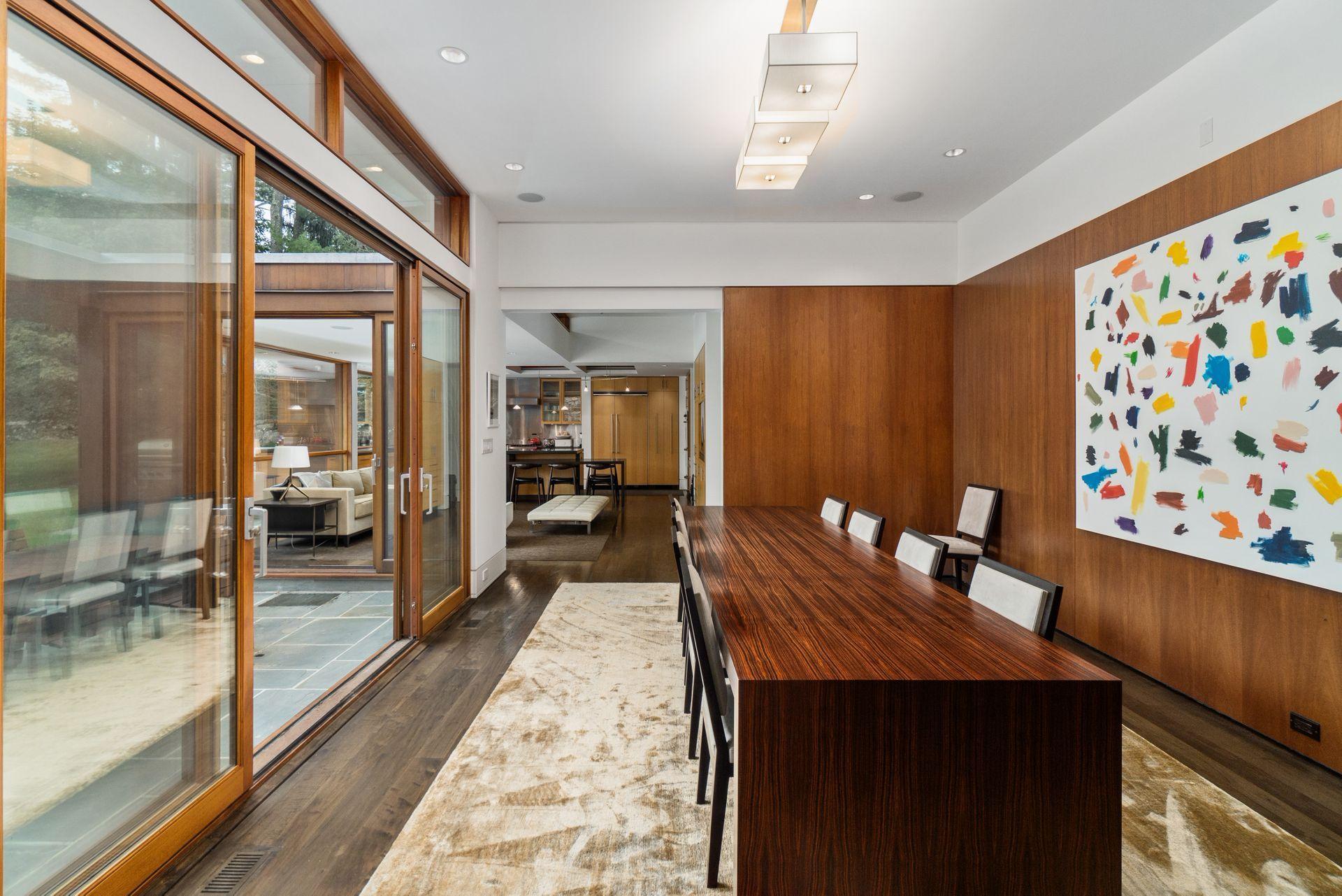 81 Cross Ridge Road New Canaan, CT 06840 - Photo 6 of 49 a dining room with wooden floor and a table