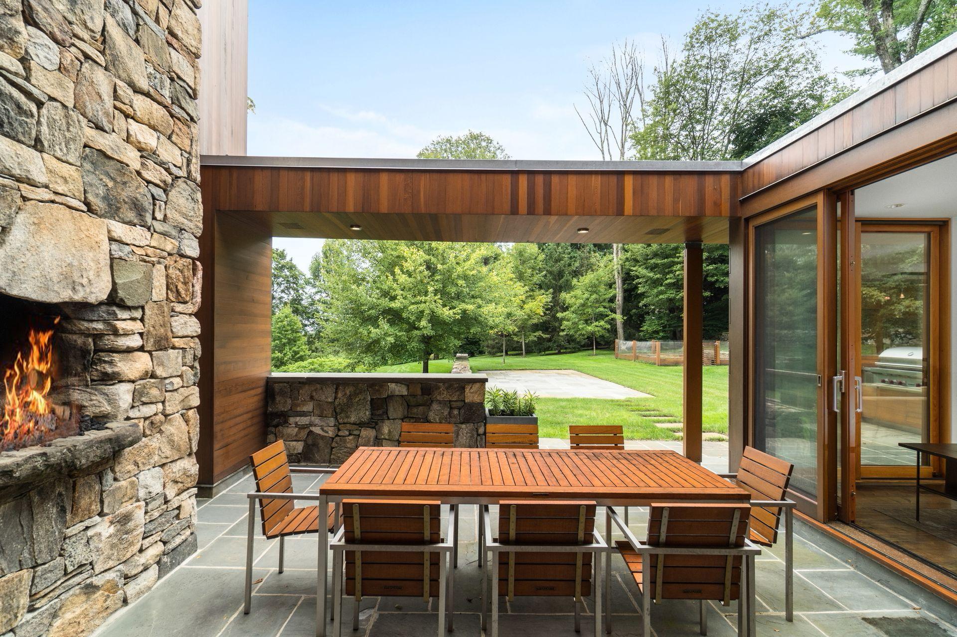 81 Cross Ridge Road New Canaan, CT 06840 - Photo 10 of 49 a outdoor dining space with furniture and yard
