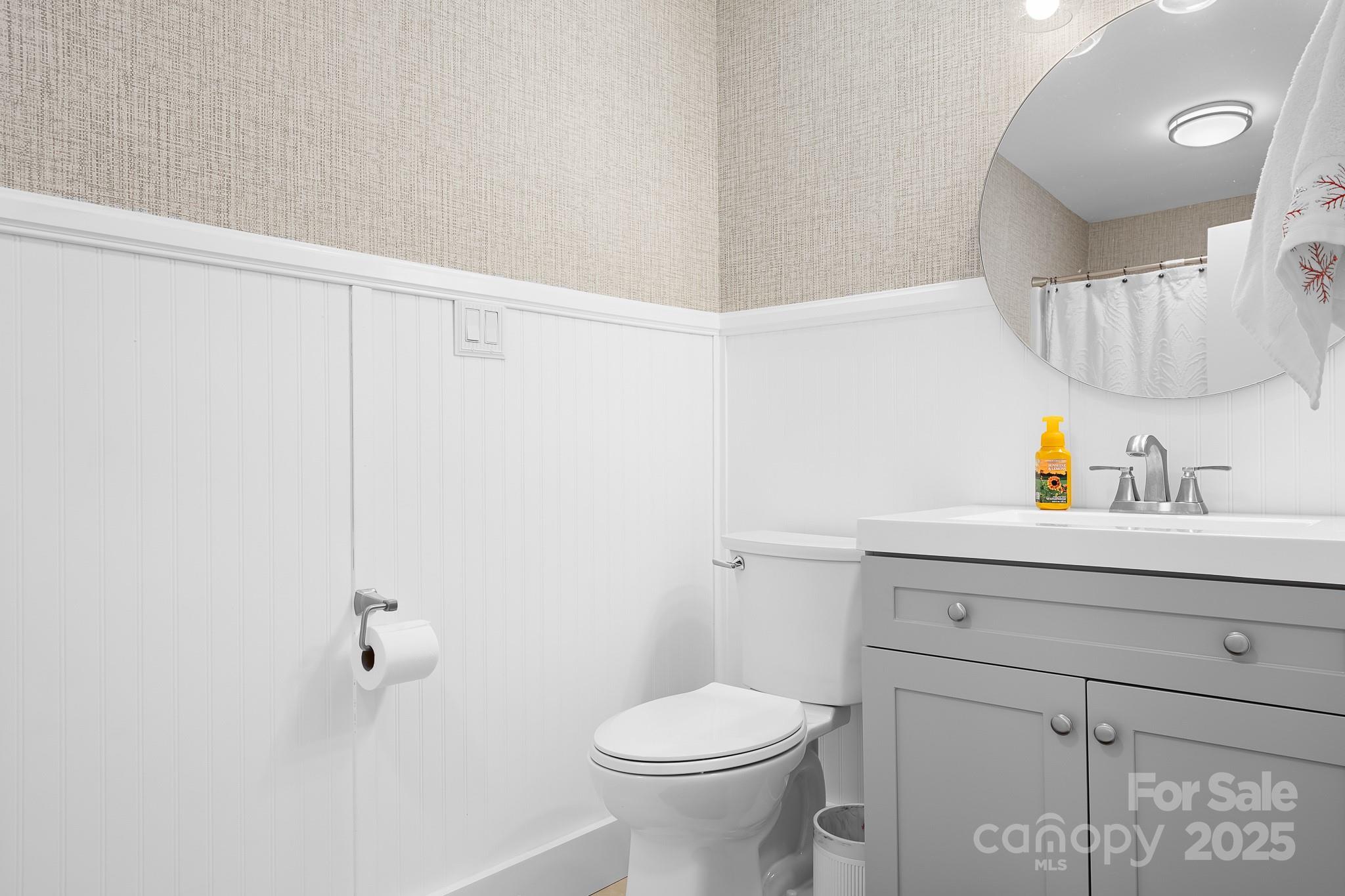 9044 Spanish Wells Court Tega Cay, SC 29708 - Photo 28 of 48 a bathroom with a sink a toilet and shower