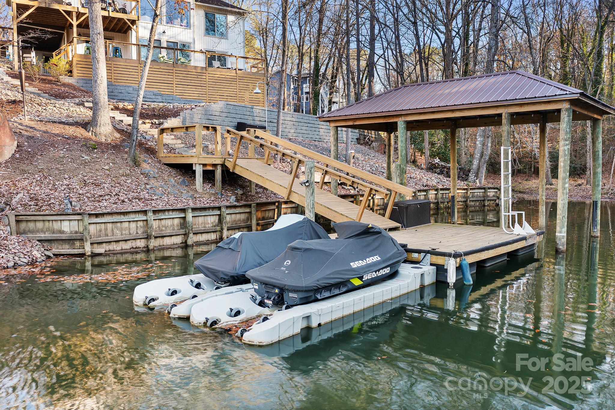 9044 Spanish Wells Court Tega Cay, SC 29708 - Photo 46 of 48 a balcony with table and chairs