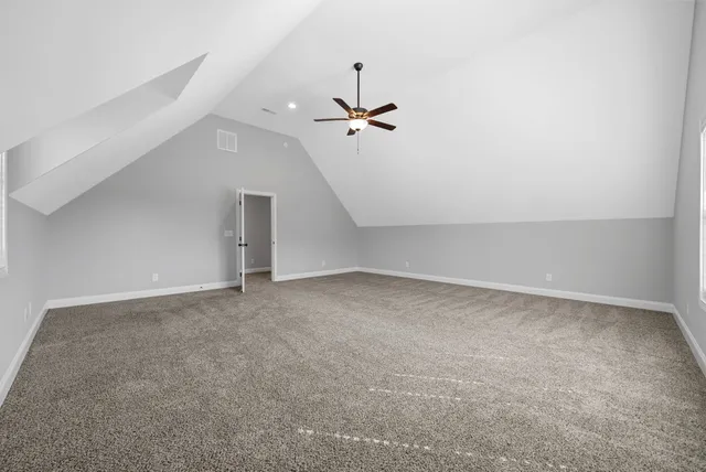 a view of a ceiling fan in a room