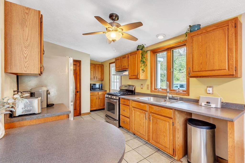 583 Main Road Chesterfield, MA 01012 - Photo 4 of 21 a kitchen with a sink appliances and a counter top space