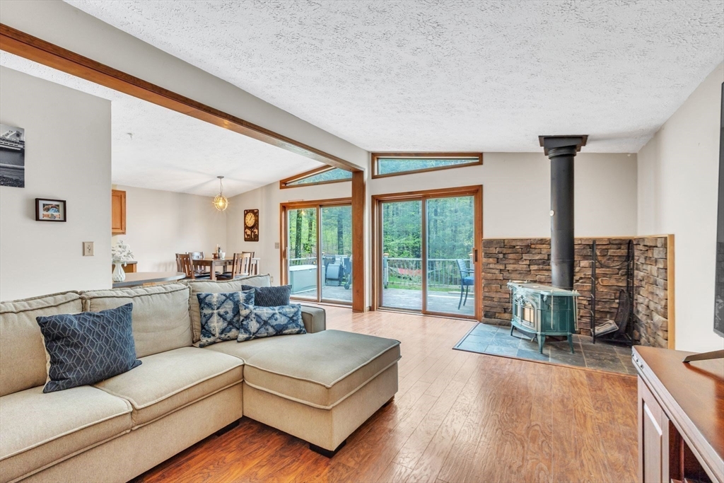 583 Main Road Chesterfield, MA 01012 - Photo 7 of 21 a living room with furniture and a large window