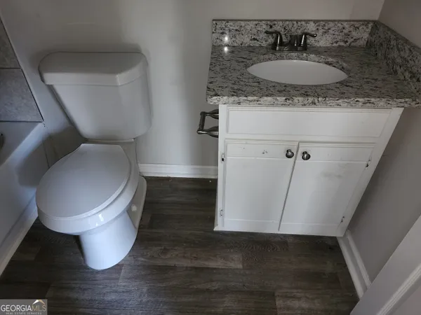 a bathroom with a sink and a toilet