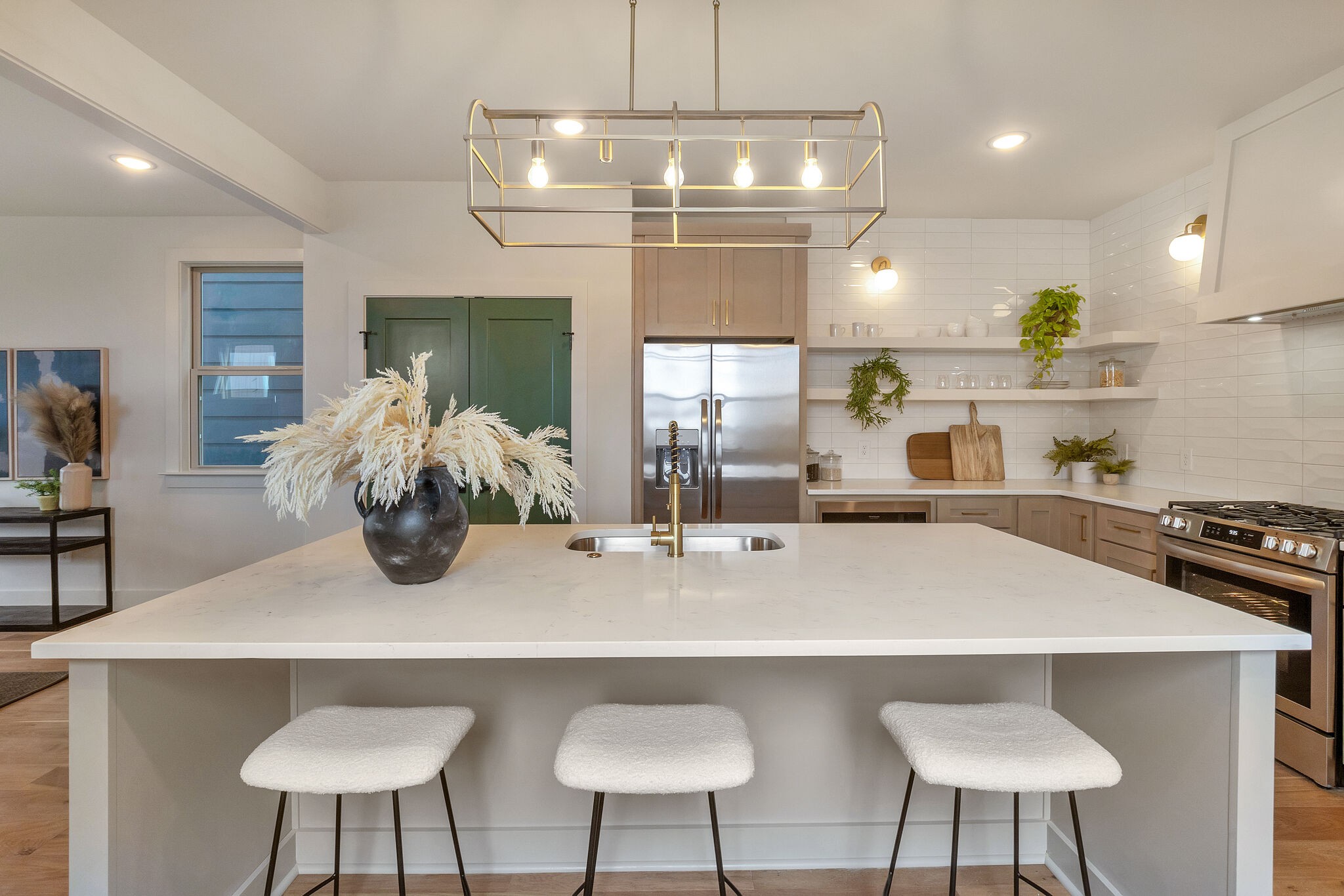 438 Patterson Street Nashville, TN 37211 - Photo 2 of 46 a kitchen with stainless steel appliances a table chairs and stove
