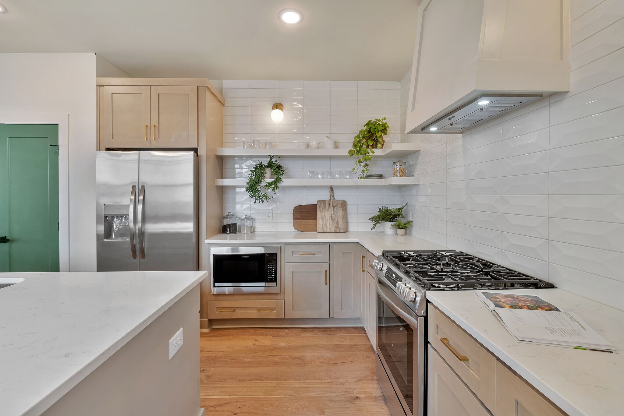 438 Patterson Street Nashville, TN 37211 - Photo 6 of 46 a kitchen with a stove a sink and a refrigerator