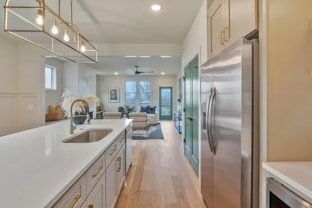 a bed room with a bed and a chair