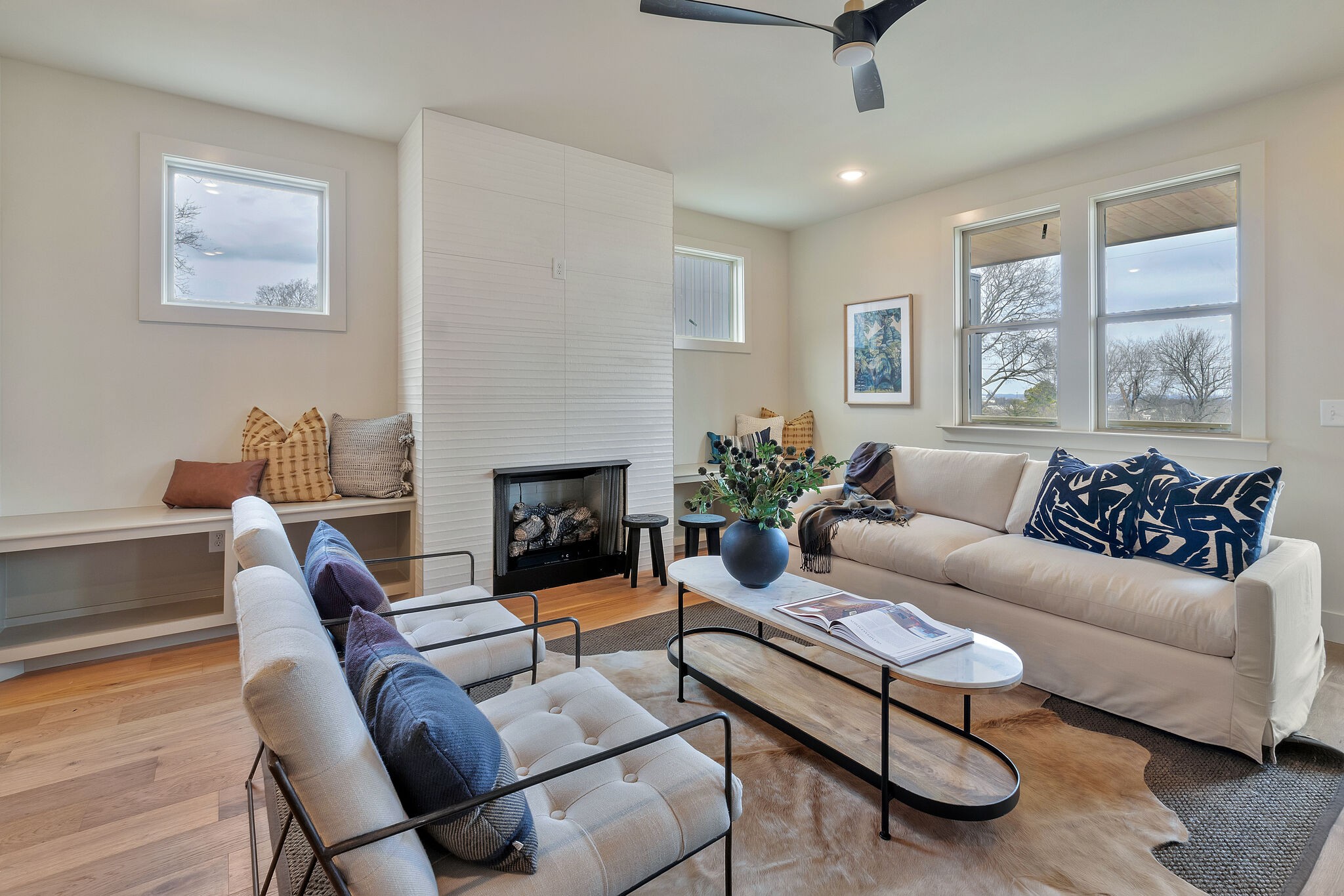 438 Patterson Street Nashville, TN 37211 - Photo 10 of 46 a living room with furniture a large window and a fireplace