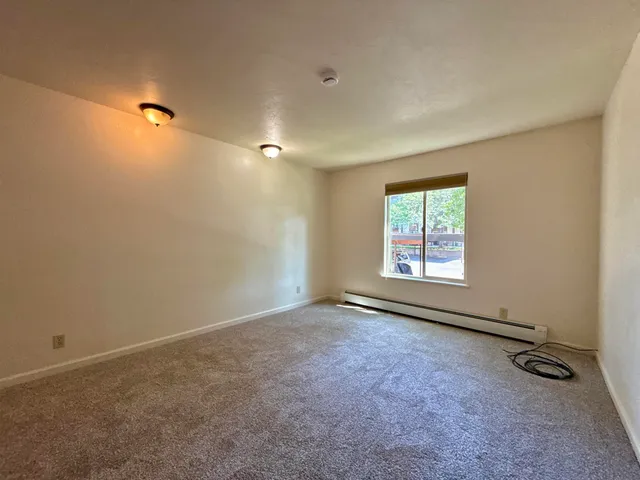 an empty room with windows