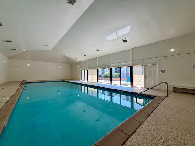 a view of a living room and a garage