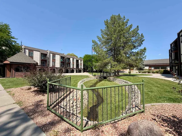 a view of swimming pool with sitting area