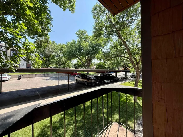 a view of a lake with houses in the back
