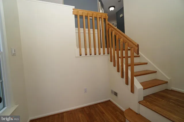 a view of entryway with wooden floor