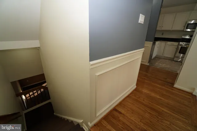 a view of wooden floor and staircase
