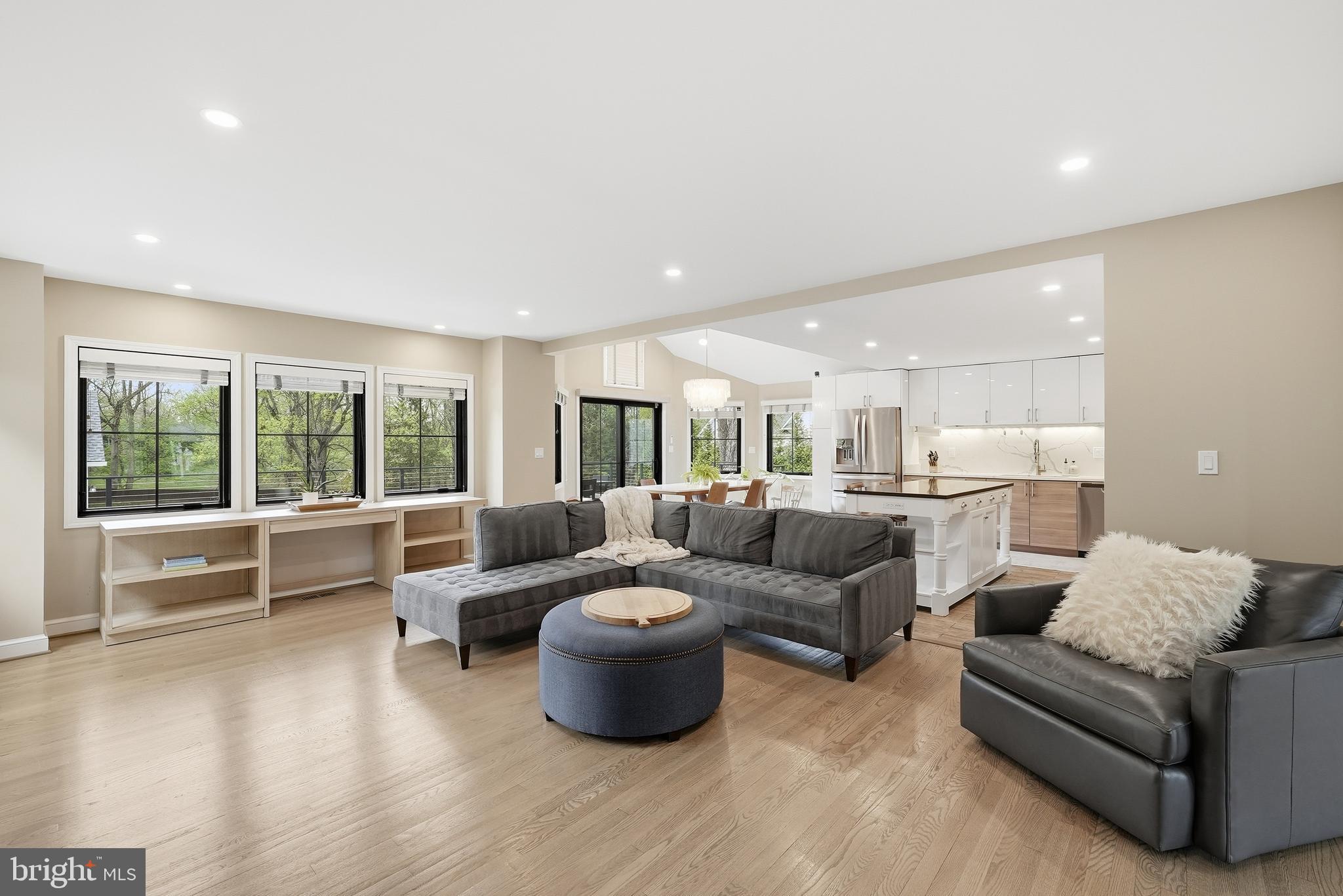 10712 Lockland Road Potomac, MD 20854 - Photo 12 of 66 a living room with furniture and a large window