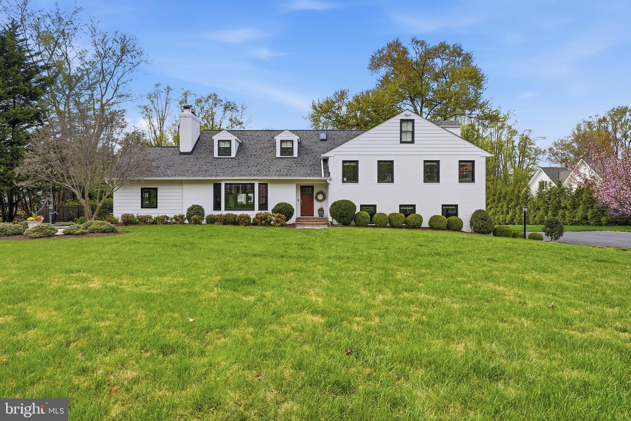 10712 Lockland Road Potomac, MD 20854 - Photo 2 of 66 a front view of a house with a yard