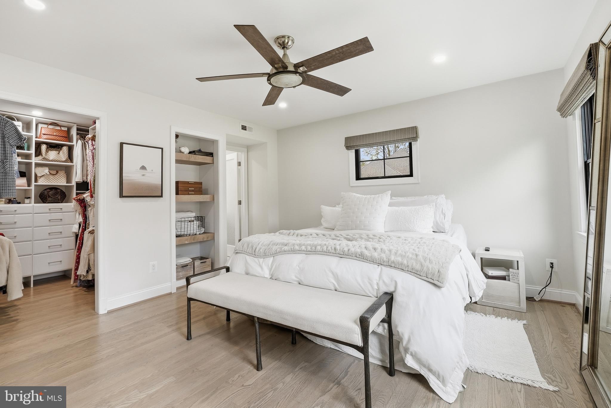 10712 Lockland Road Potomac, MD 20854 - Photo 26 of 66 a bedroom with a bed and a table