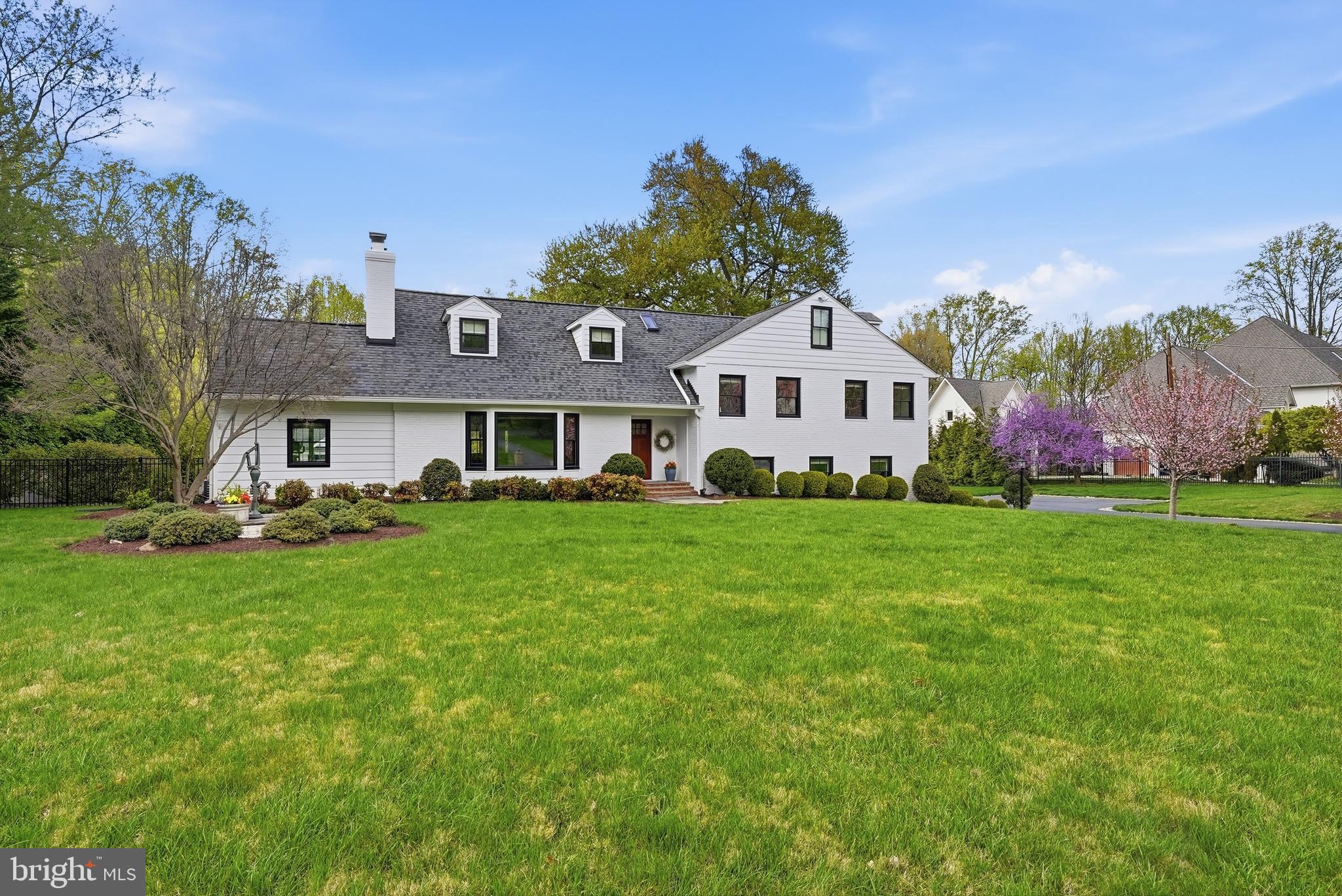 10712 Lockland Road Potomac, MD 20854 - Photo 3 of 66 a front view of house with yard and green space