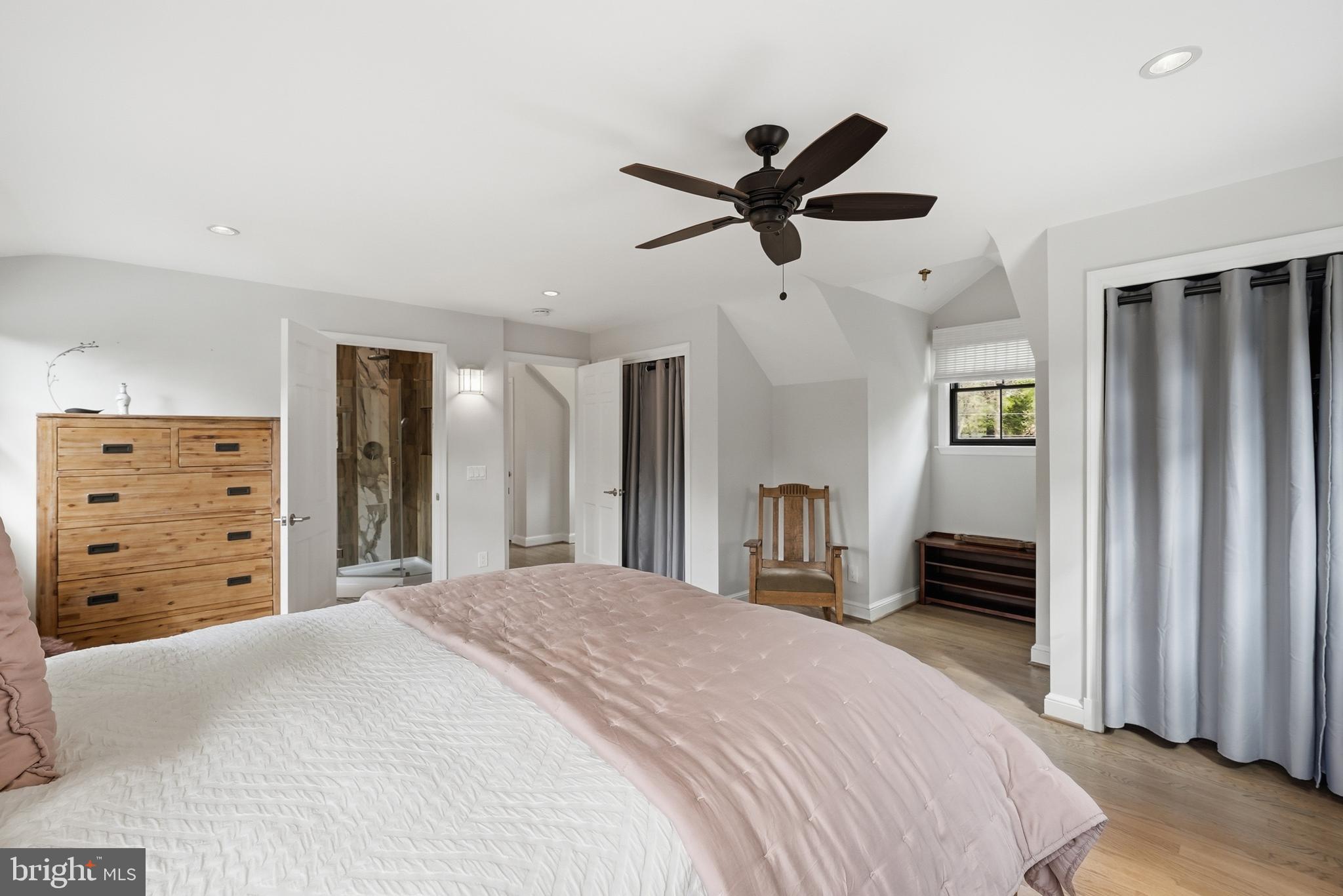 10712 Lockland Road Potomac, MD 20854 - Photo 38 of 66 a bedroom with a bed and a dresser