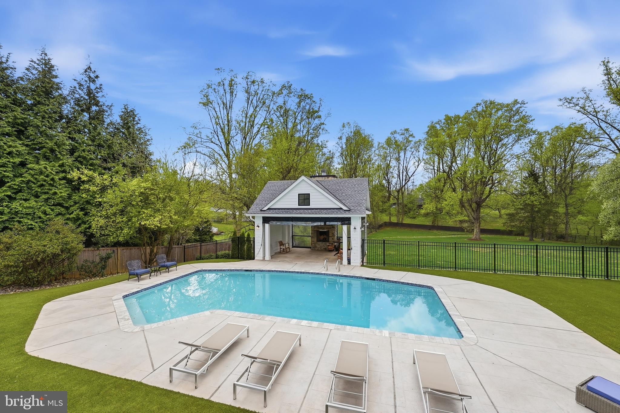 10712 Lockland Road Potomac, MD 20854 - Photo 57 of 66 a view of a house with a yard