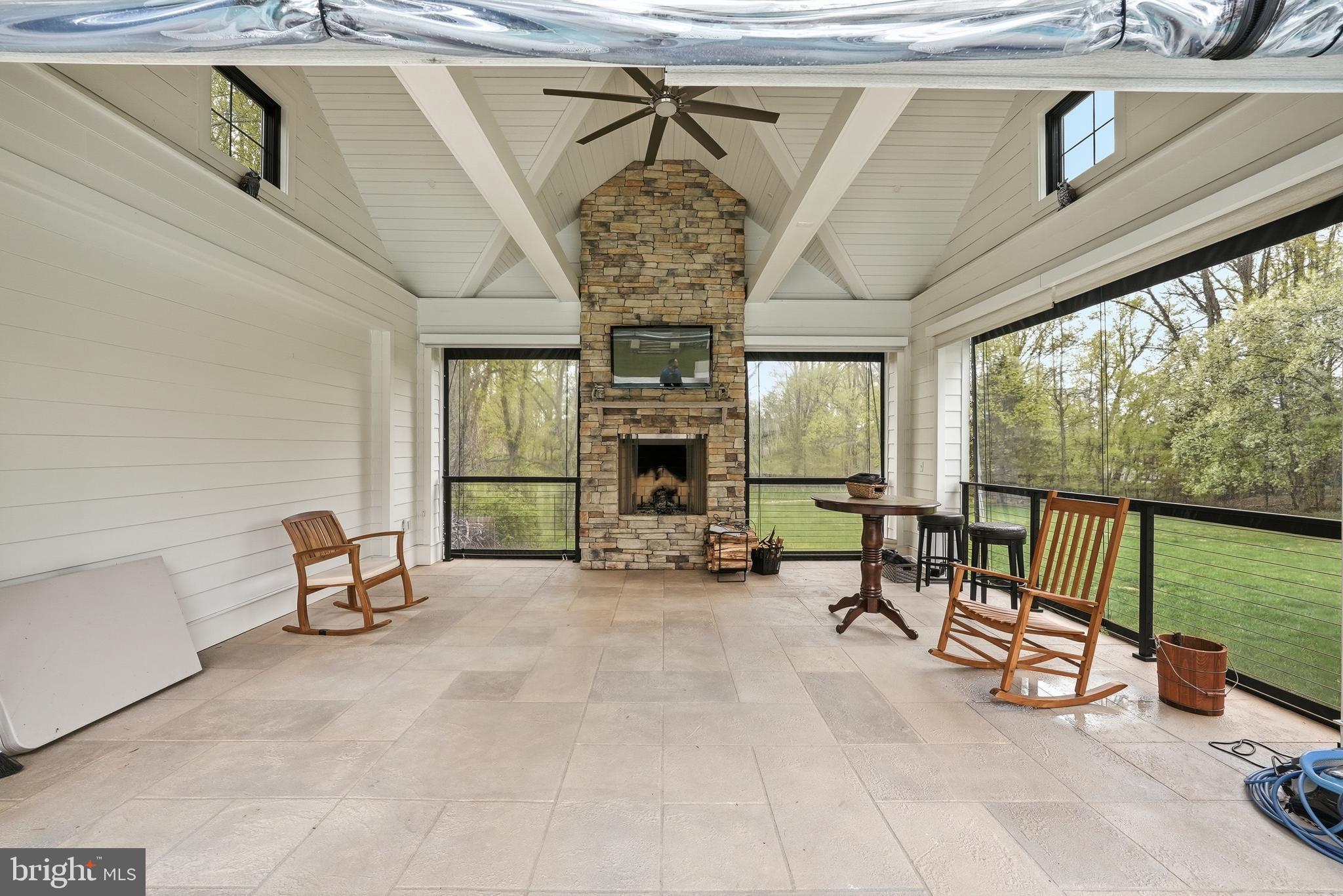 10712 Lockland Road Potomac, MD 20854 - Photo 60 of 66 a view of a livingroom with furniture and a fireplace