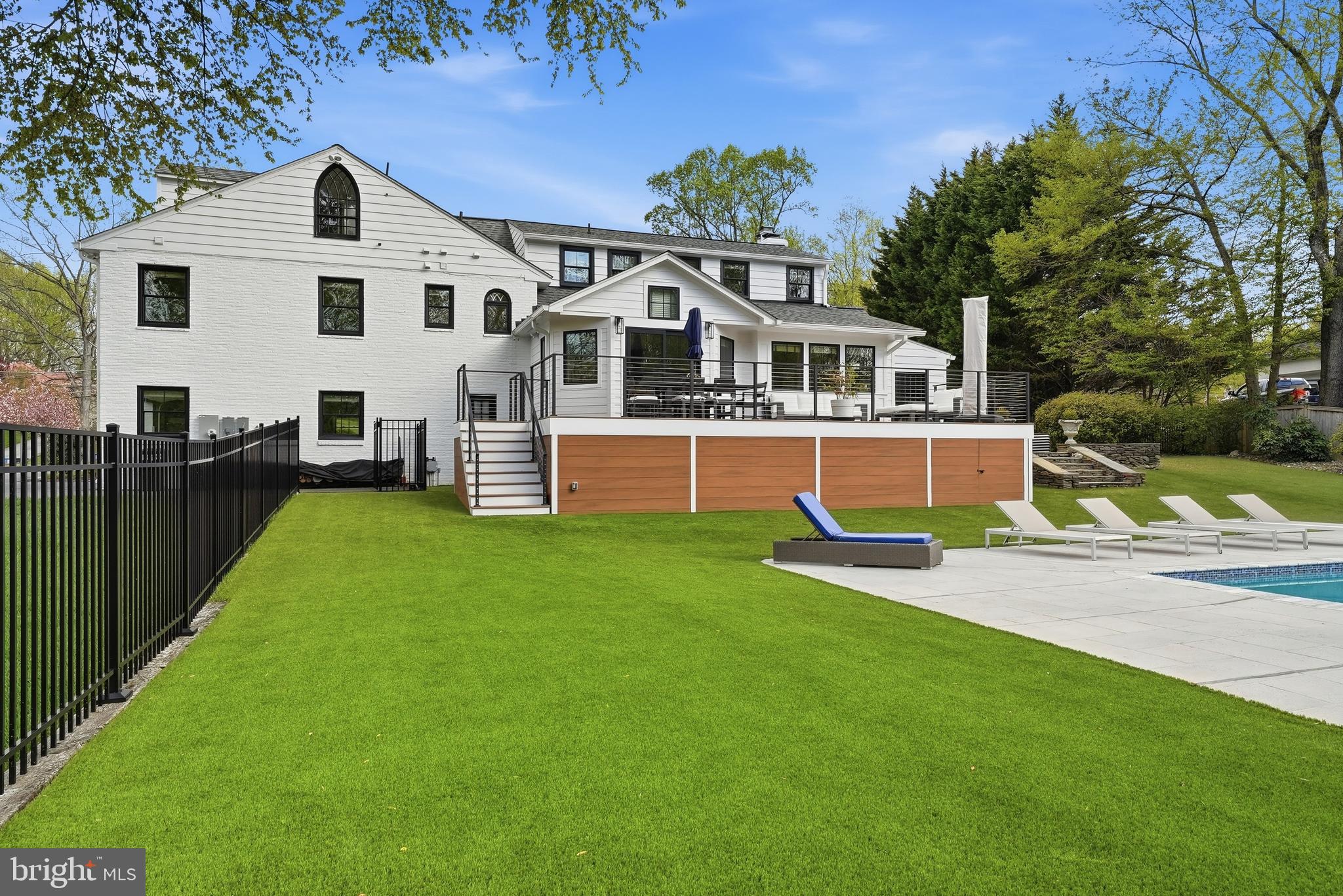 10712 Lockland Road Potomac, MD 20854 - Photo 62 of 66 a front view of house with yard and green space