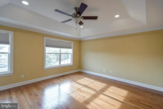 a view of a kitchen with microwave and stove top oven