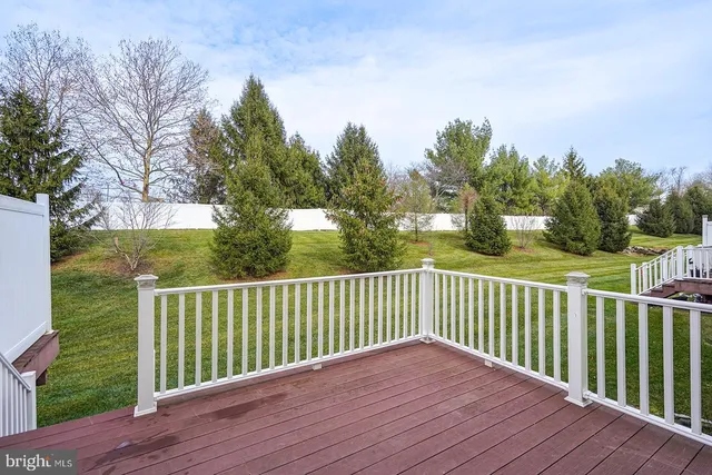 a view of a wooden roof deck