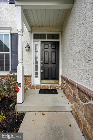 a front view of a house with a porch