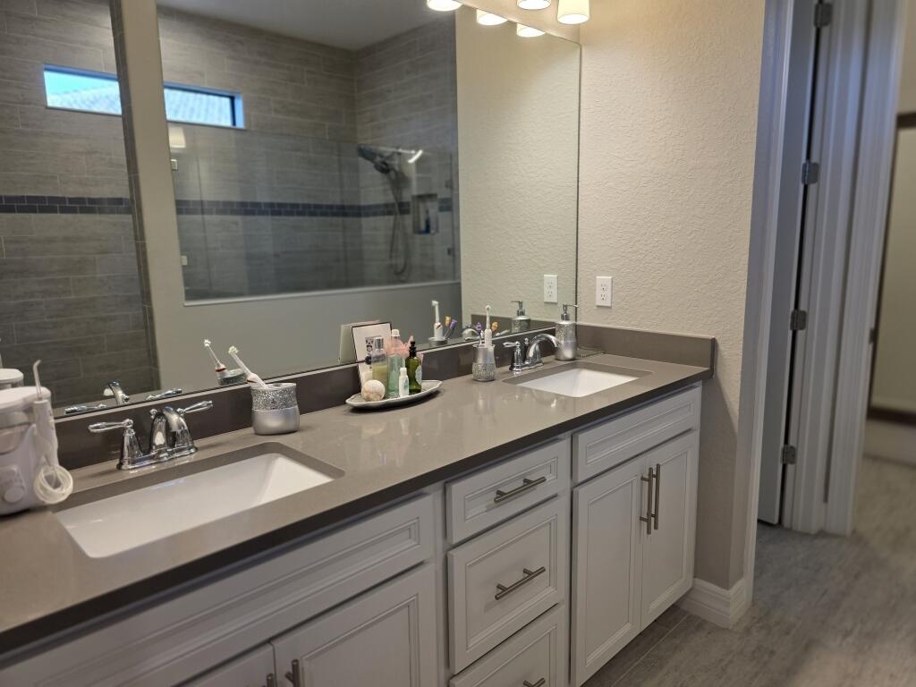 527 Southeast Vallarta Dr Port Port St. Lucie, FL 34984 - Photo 12 of 59 12-Master Double Sinks
