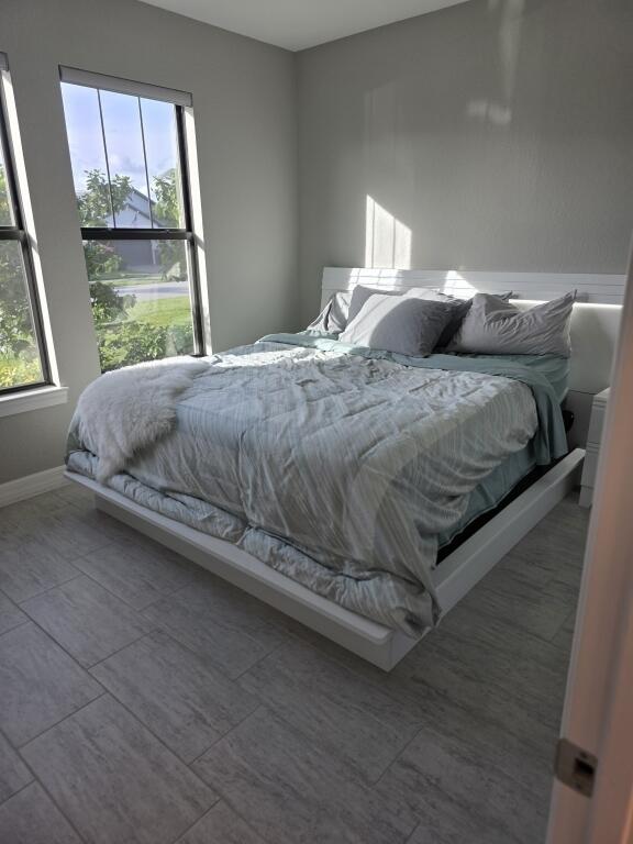 527 Southeast Vallarta Dr Port Port St. Lucie, FL 34984 - Photo 30 of 59 31-Secondary Bedroom