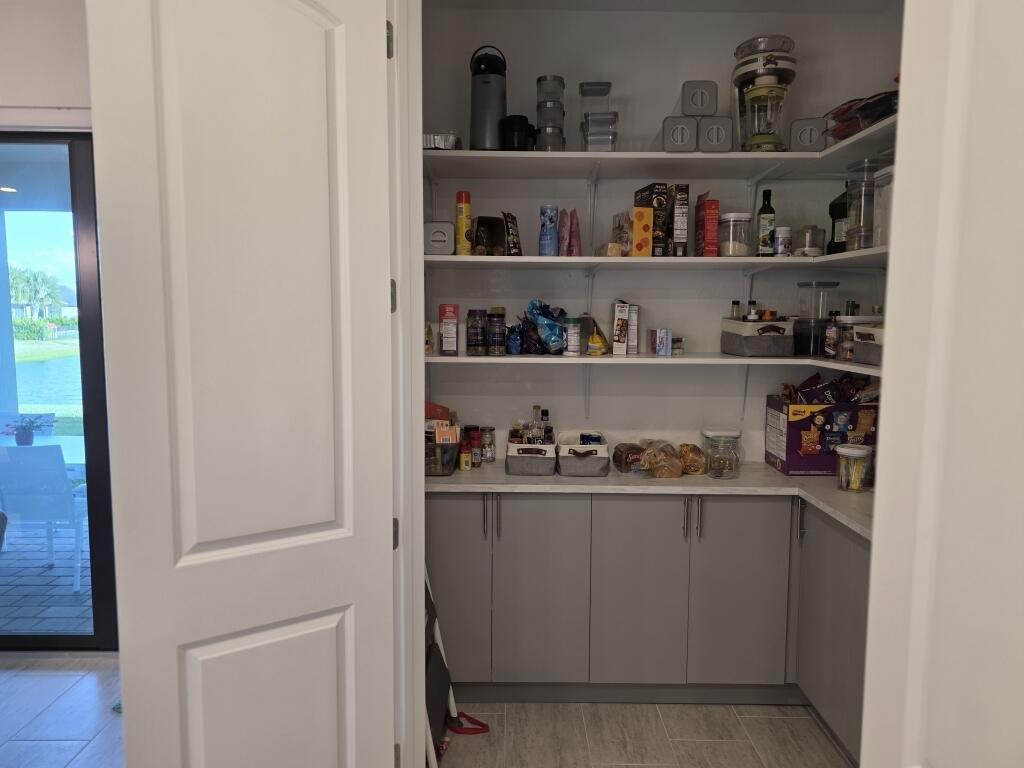 527 Southeast Vallarta Dr Port Port St. Lucie, FL 34984 - Photo 39 of 59 41-Kitchen Pantry 2