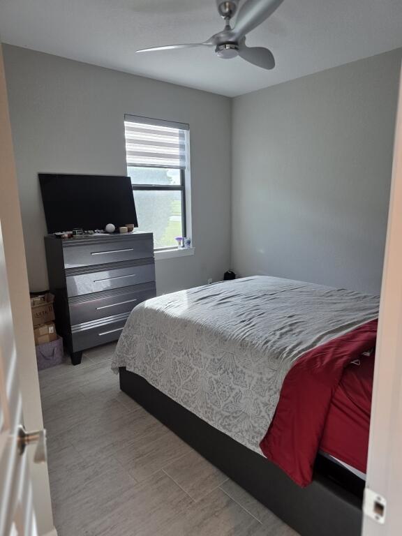 527 Southeast Vallarta Dr Port Port St. Lucie, FL 34984 - Photo 40 of 59 42-Third Bedroom w bath