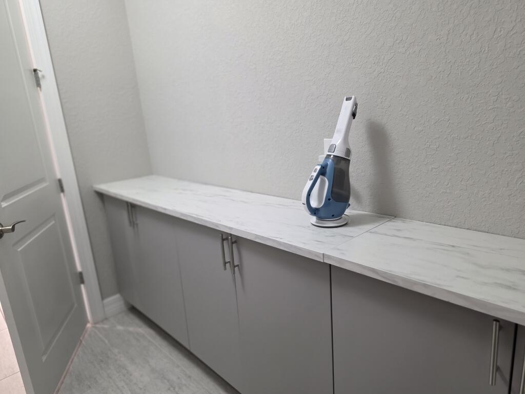 527 Southeast Vallarta Dr Port Port St. Lucie, FL 34984 - Photo 45 of 59 47-Laundry 2