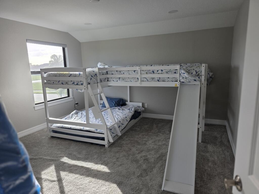 527 Southeast Vallarta Dr Port Port St. Lucie, FL 34984 - Photo 53 of 59 56-Upstairs Kids Bedroom