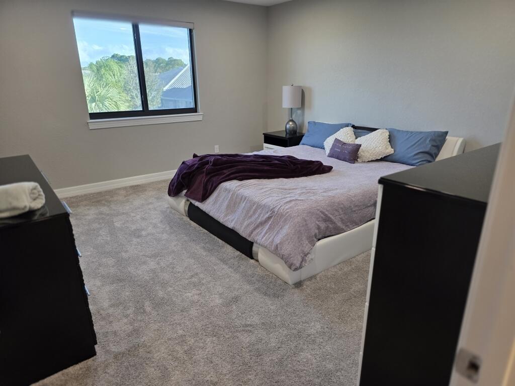 527 Southeast Vallarta Dr Port Port St. Lucie, FL 34984 - Photo 56 of 59 59-Upstairs Fifth Bedroom